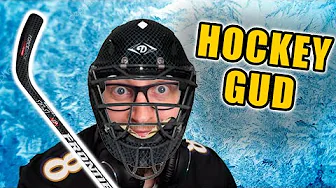 Iskold Ishockey Spiller Slår med Staven