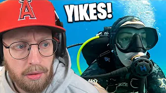 Dykker med hajer og giftige fisk