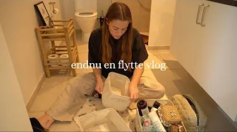 vi indretter badeværelse og hænger ting op