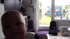 Baby eating babyfood for the first time