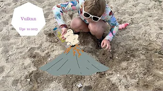 LAVER VUKLAN PÅ STRANDEN